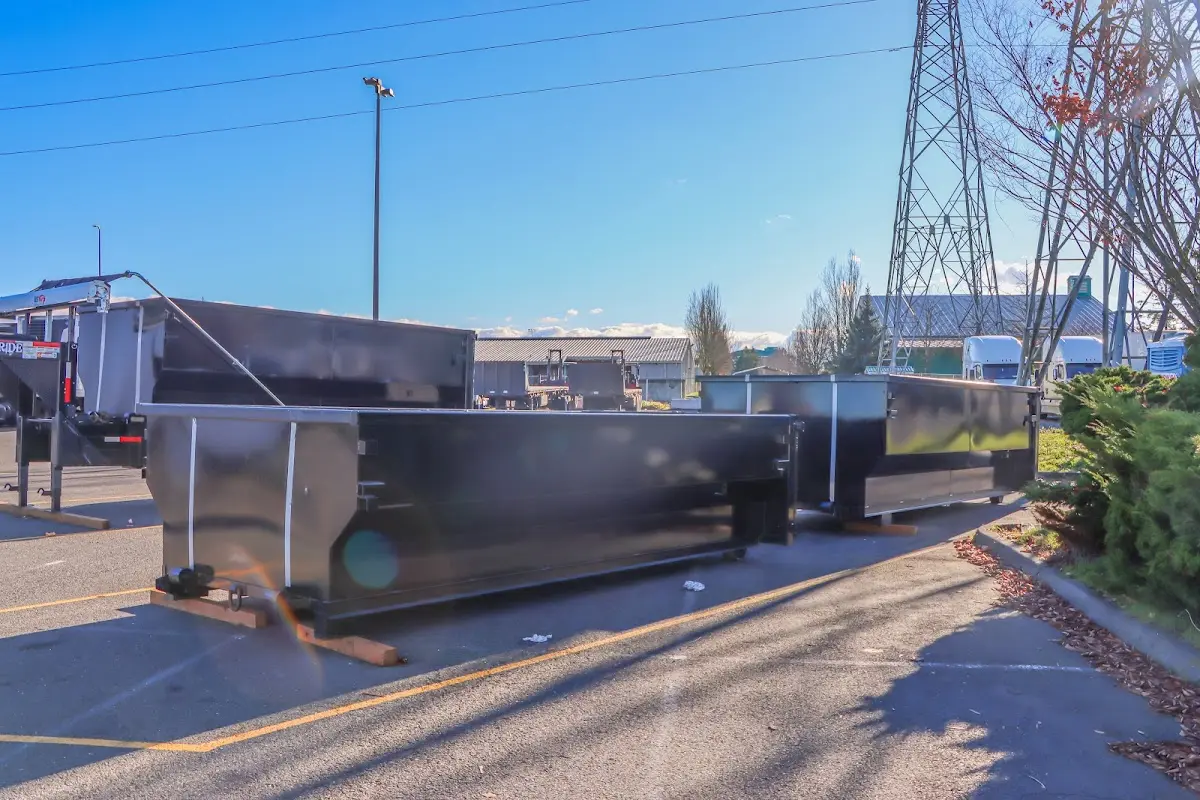 Roll-off dumpster ready for waste disposal at job site for 3 Yard Dumpster Rental in Penitas